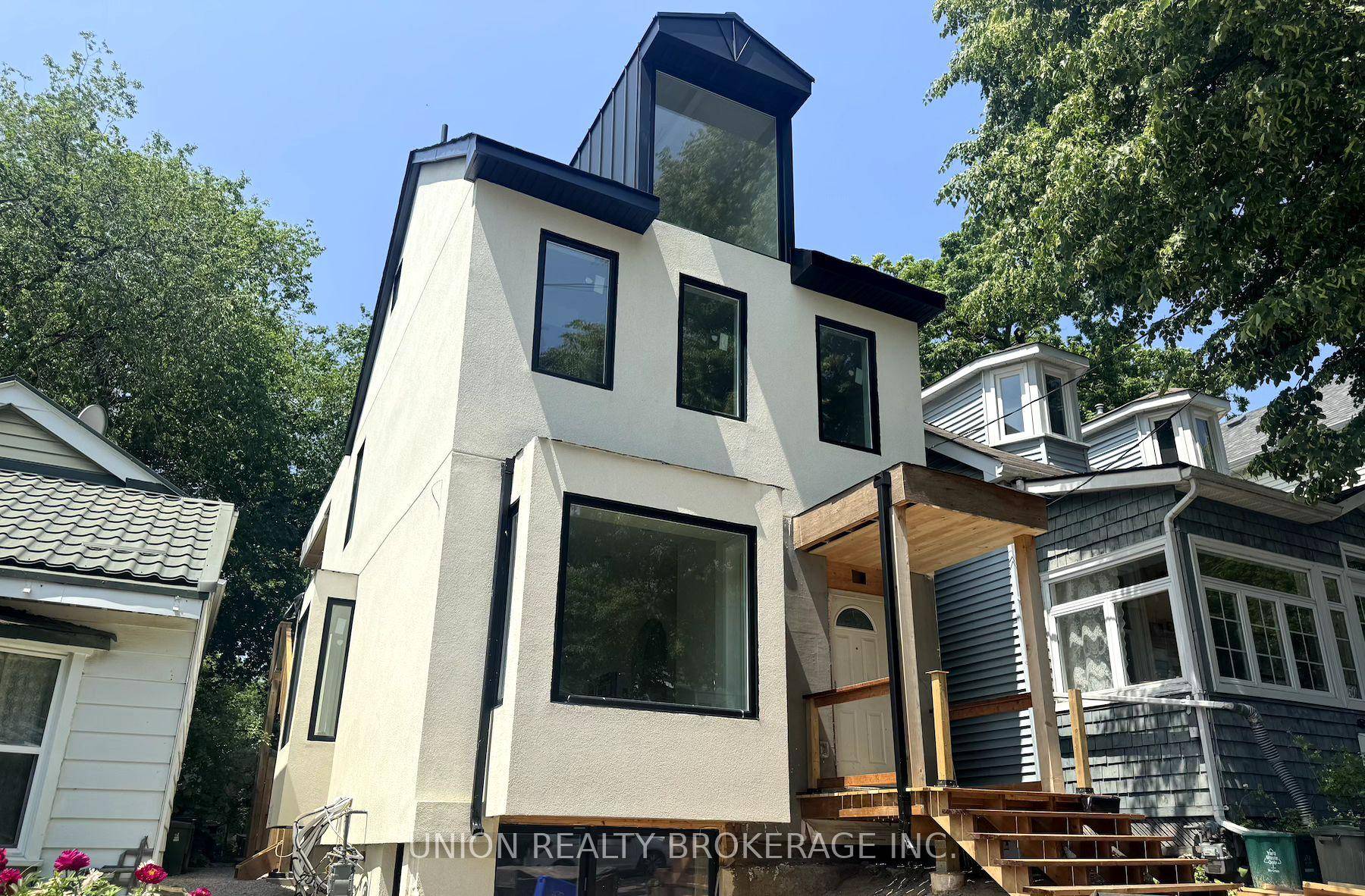 Fully renovated from the ground up, this bright and spacious unit features soaring ceilings and large above grade windows.
