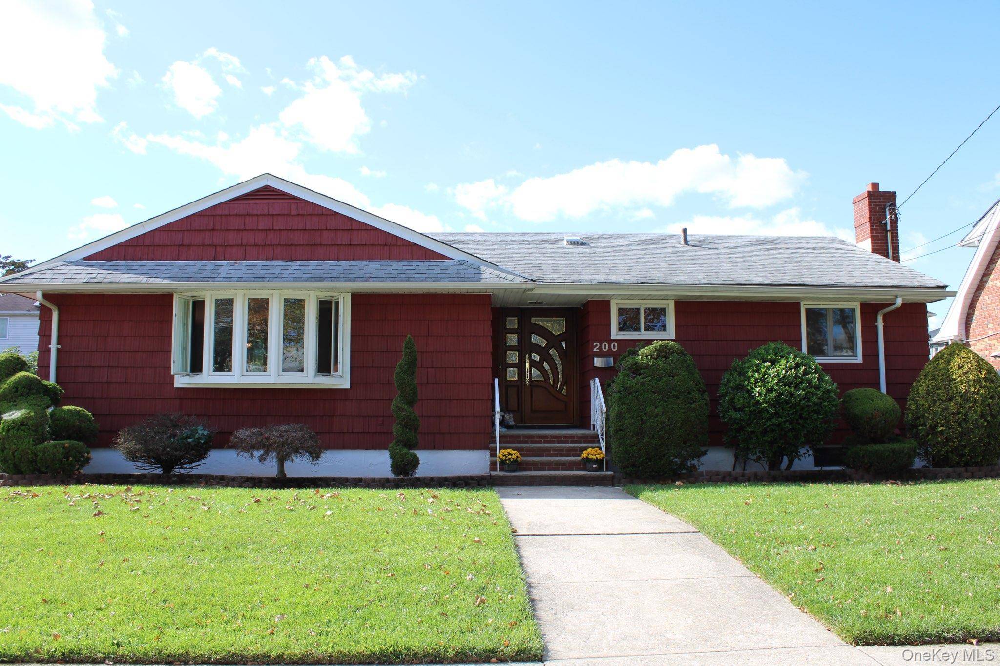Welcome to this beautifully expanded ranch featuring 3 bedrooms, 2 full baths, and hardwood floors throughout.