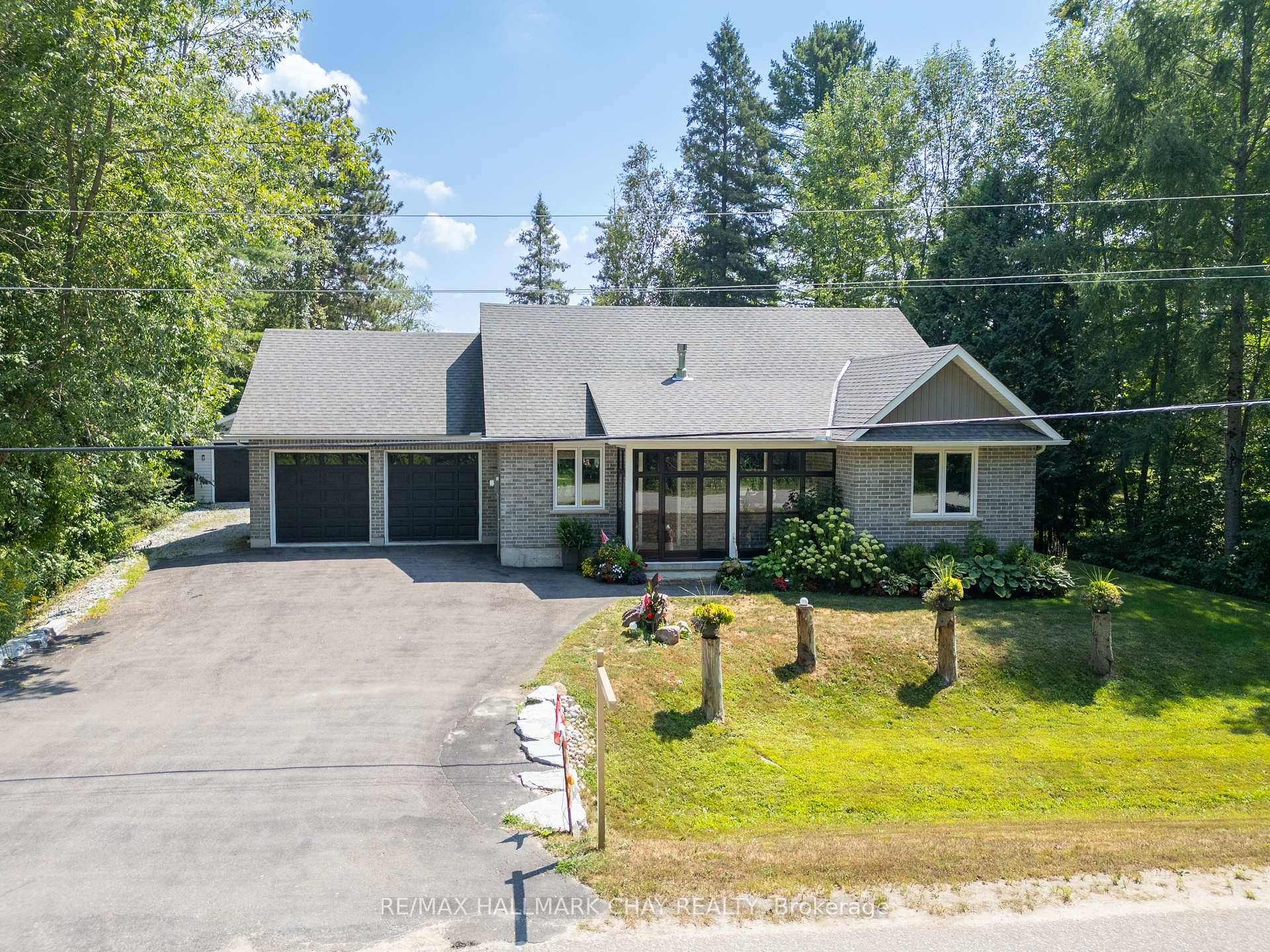 Located on the serene Black River in Ramara Township, this beautiful brick bungalow, built in 2018, offers the perfect blend of comfort, style, and waterfront living.