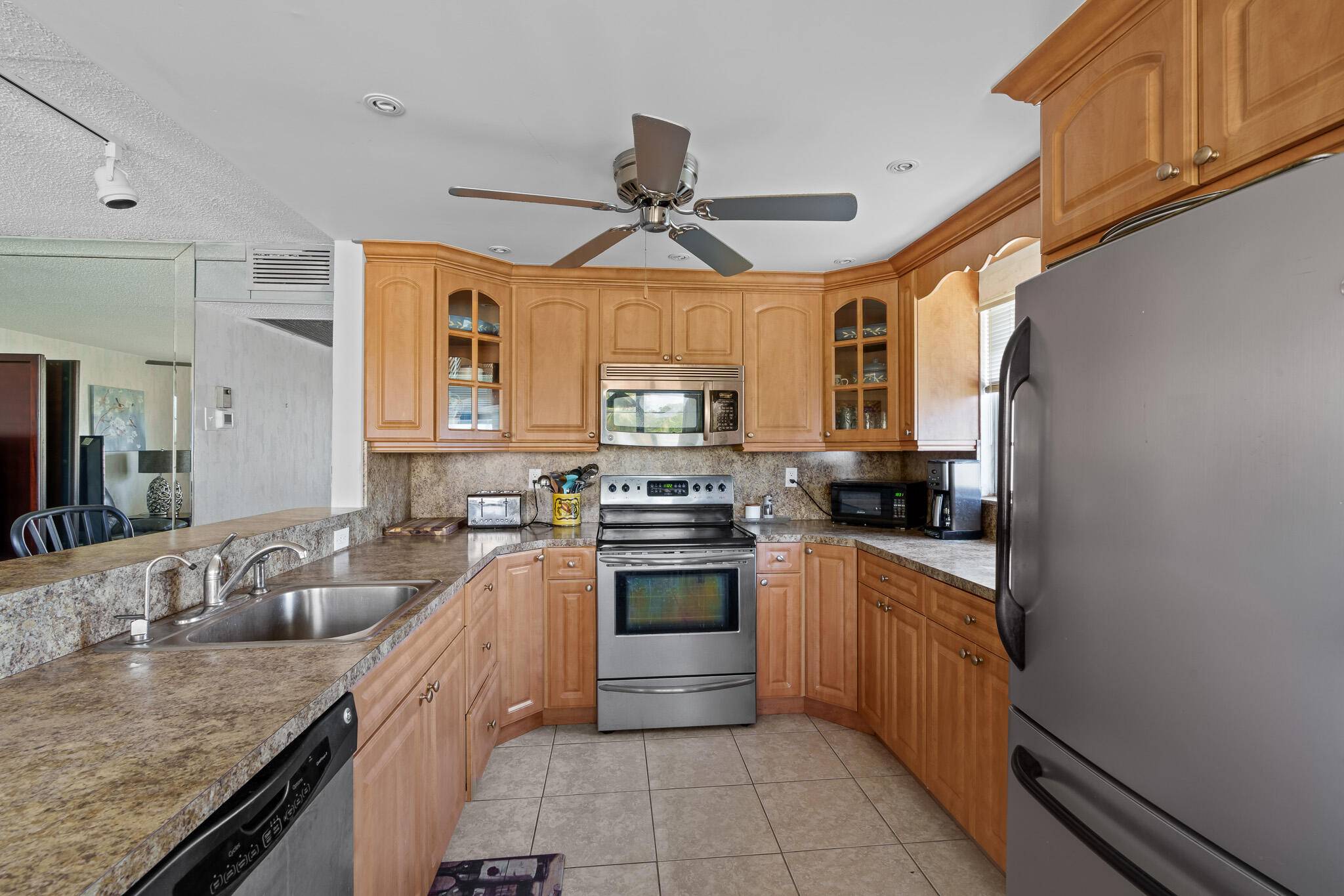 MOTIVATED ! Gorgeous corner unit located in the highly desirable 55 community of Century Village.