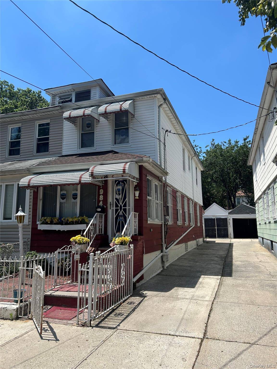 Welcome to 984 Troy Avenue, Brooklyn a semi detached frame home nestled on a quiet, dead end street in East Flatbush !
