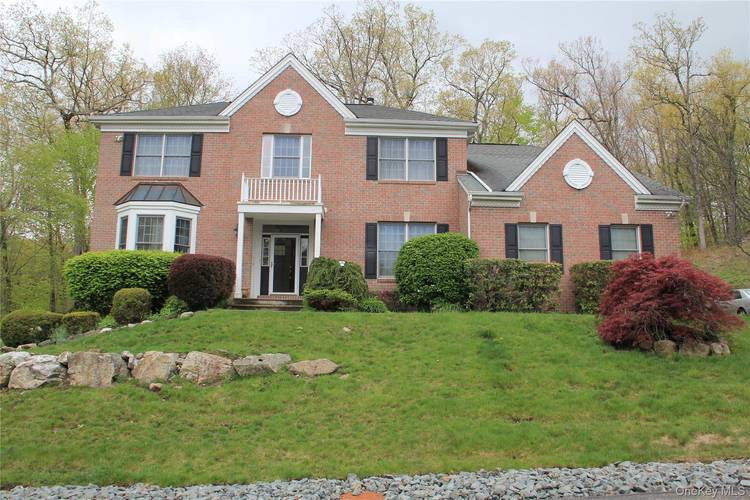 Available July 1, 2026, this well maintained Colonial residence is located within The Woodlands, one of Tuxedo's most desirable HOA communities.