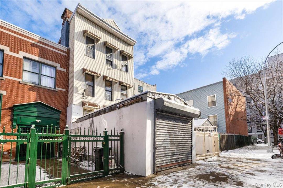 Two family duplex residence located on a quiet residential block in the West Farms section of the Bronx.