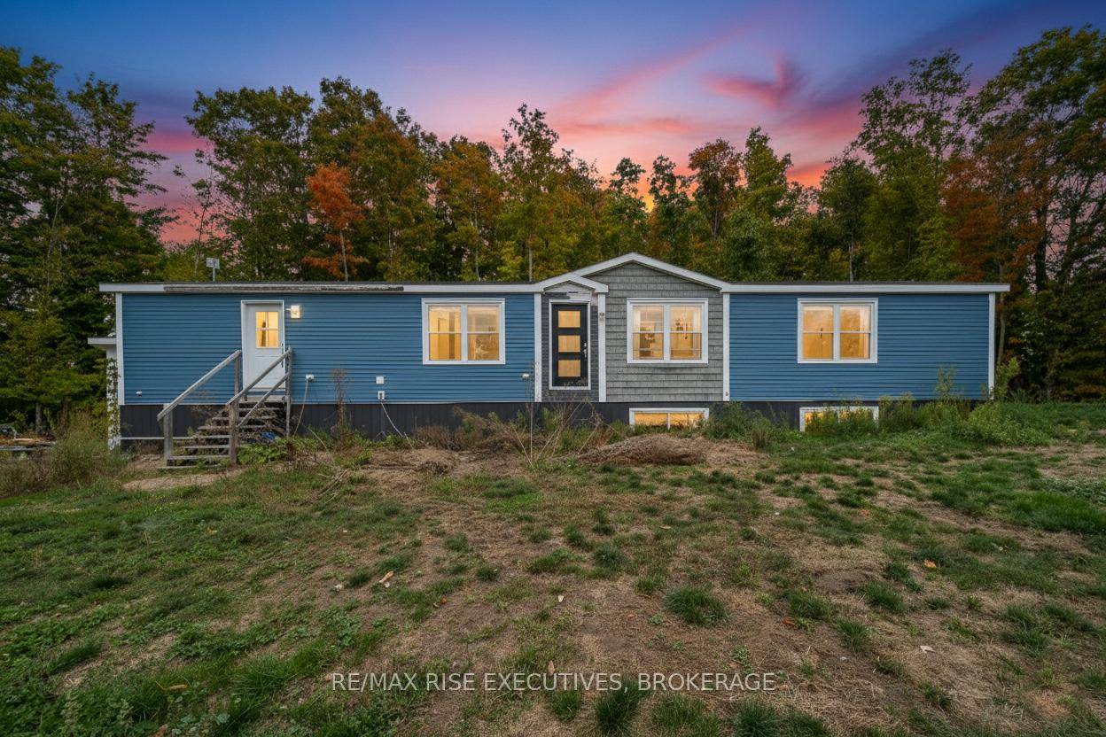 If you've been dreaming of a home that feels brand new and perfectly peaceful, this beautiful bungalow is the one to see.