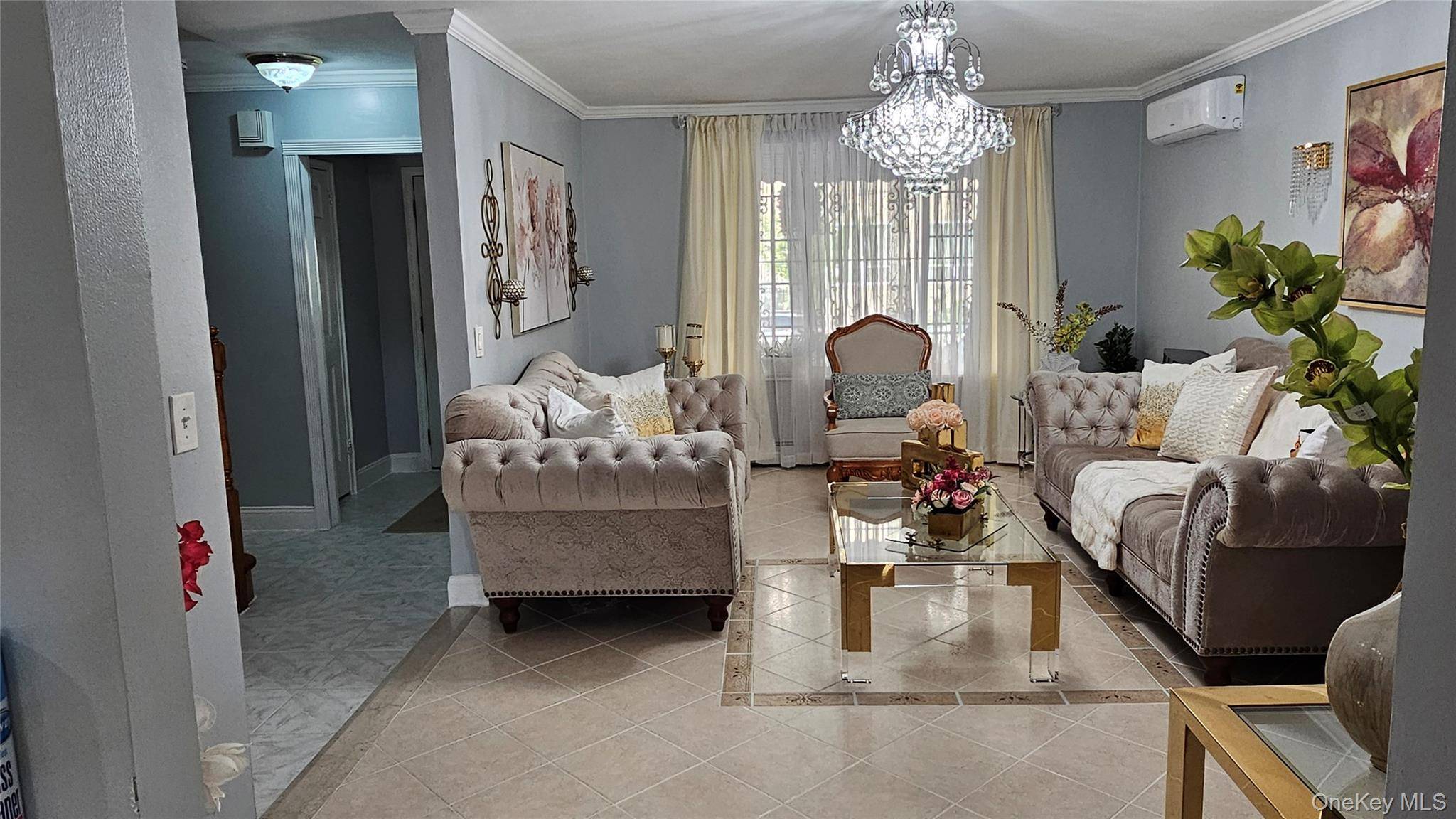 Discover a rare blend of modern elegance and suburban tranquility in this stunning two family residence nestled in the Pelham Parkway neighborhood of the Bronx.