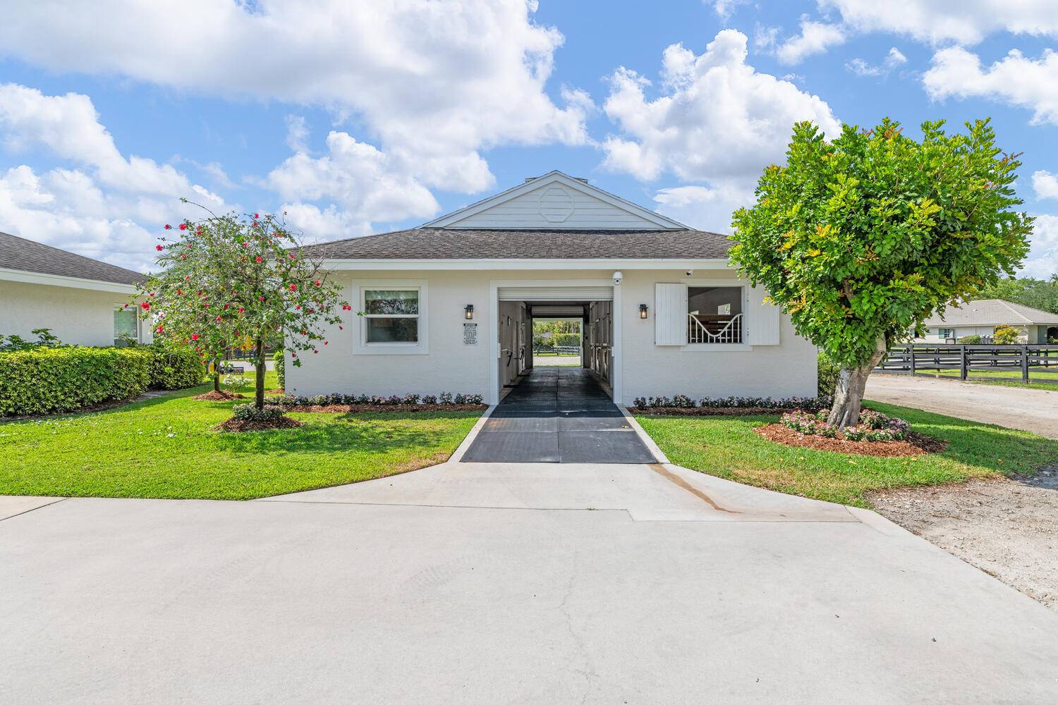 Welcome to this beautiful dressage farm available for seasonal lease in Wellington's prestigious Saddle Trail neighborhood, just steps from the bridle path and a short hack to the showgrounds.