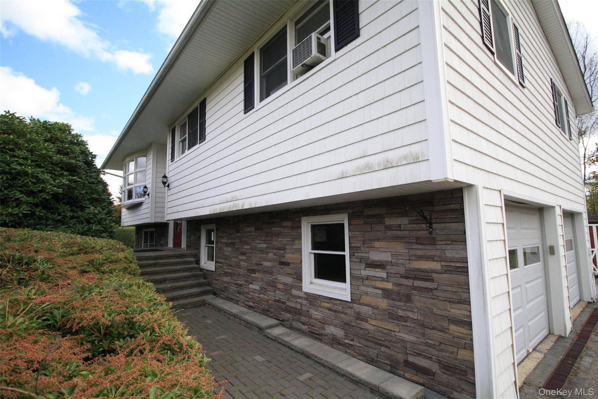 Private setting, Long drive as house is set back off the street.