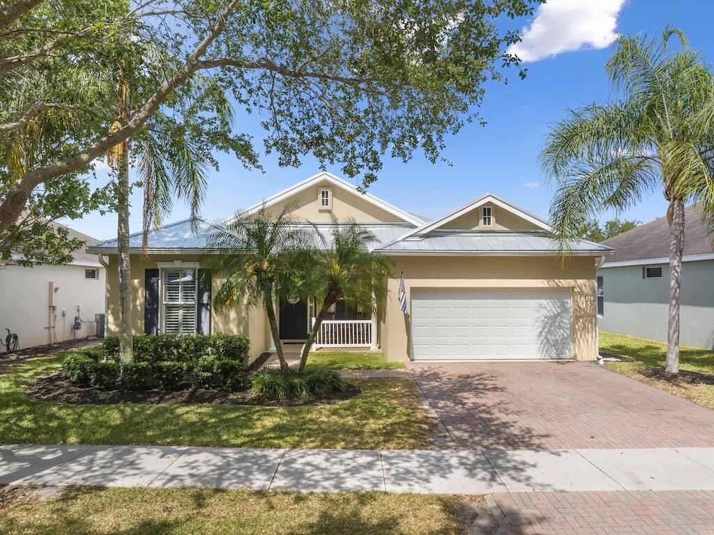 Welcome to 10721 SW Westlawn Blvd, a charming 3 bedroom, 2 bathroom home nestled in the desirable Bedford Park, Tradition community of Port Saint Lucie.