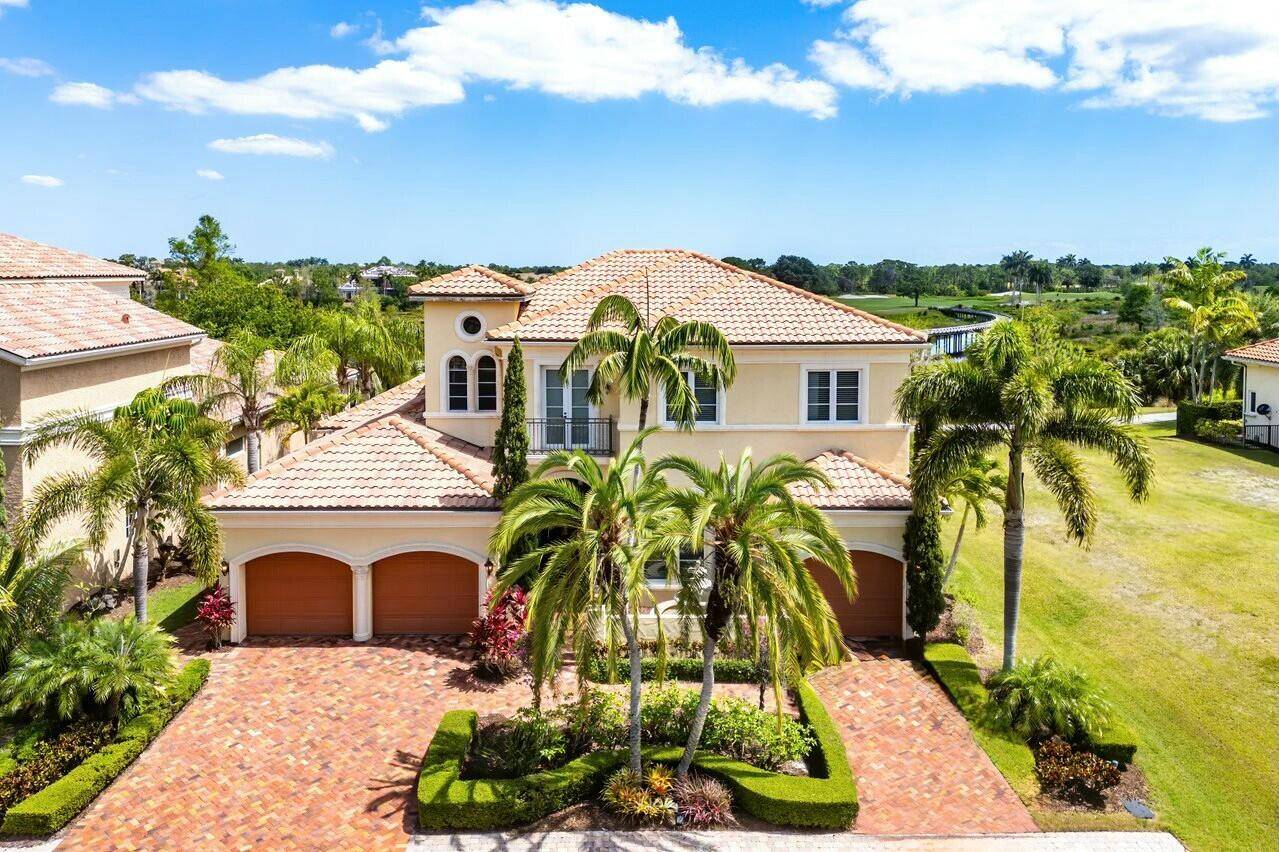From the fountain entry to the covered back porch pool, this Tuscan beauty baths the owner in luxury.