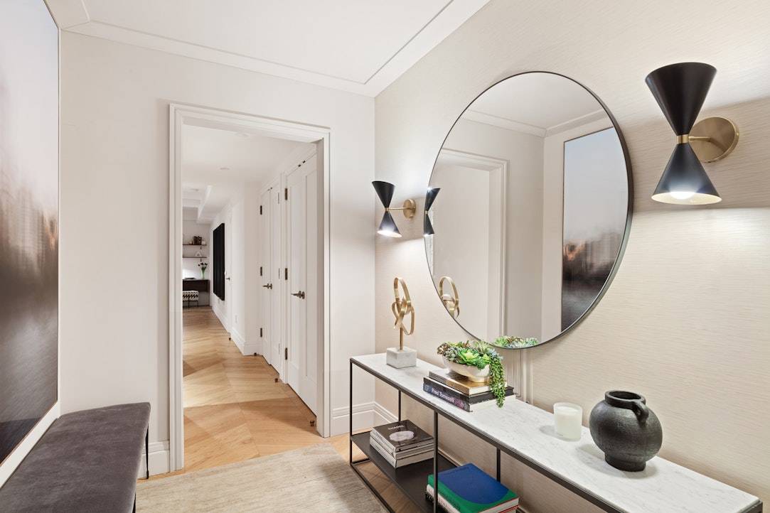 Residence 6F is a stunning one bedroom, one and a half bathroom featuring a generous foyer and expansive living dining room.