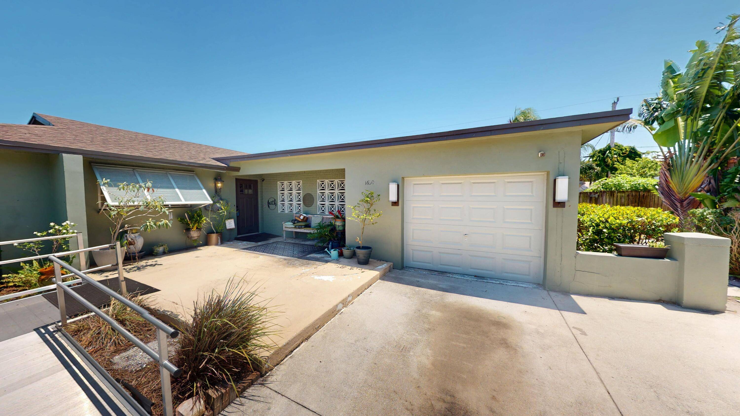 Welcome to this beautifully upgraded pool home in the heart of West Palm Beach.