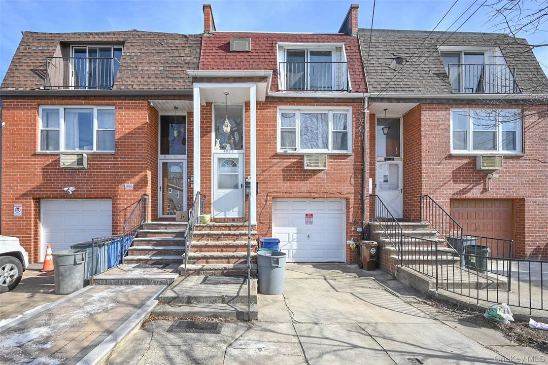Brick attached multi level home in the heart of Bayside offering 3 bedrooms and 2.