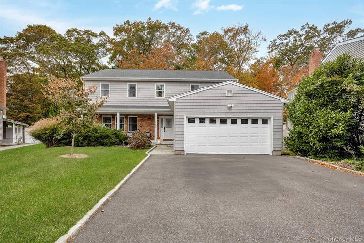 Welcome to this charming Colonial nestled in a secluded cul de sac within the highly sought after Wantagh School District.