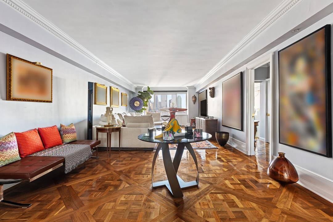 A rare floor through sanctuary with sweeping river and skyline views awaits at Residence 10H at 45 Sutton Place South.