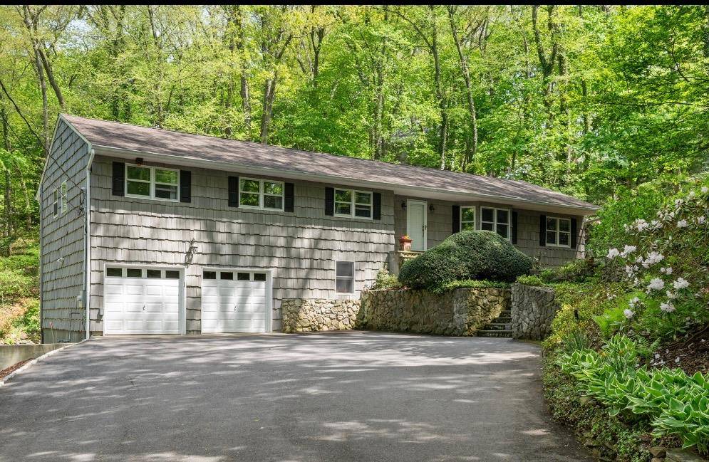 Welcome to 96 Bay Road, a beautifully maintained ranch style home nestled in a private, professionally landscaped setting bordering prestigious Huntington Bay.