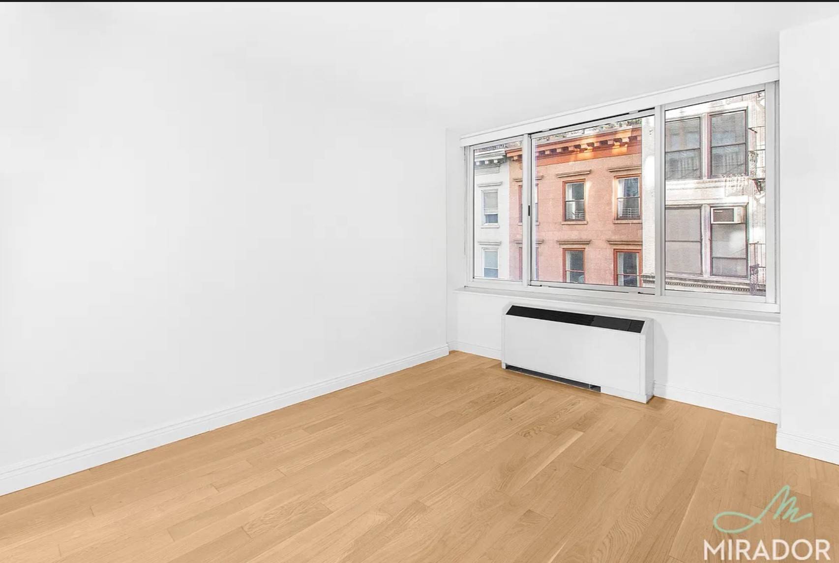 Stunning one bedroom residence, featuring a large living space, king sized bedroom, and pass thru kitchen with granite countertops and stainless steel appliances.