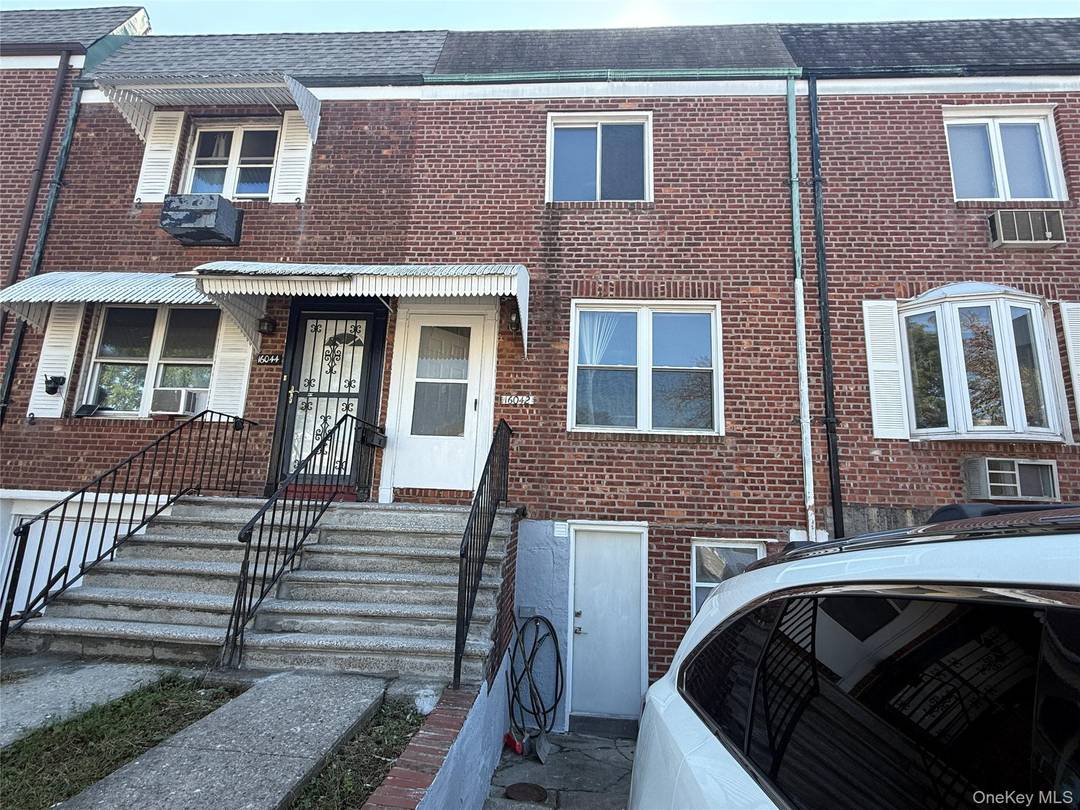 Charming All Brick Attached Townhouse in Prime North Flushing.