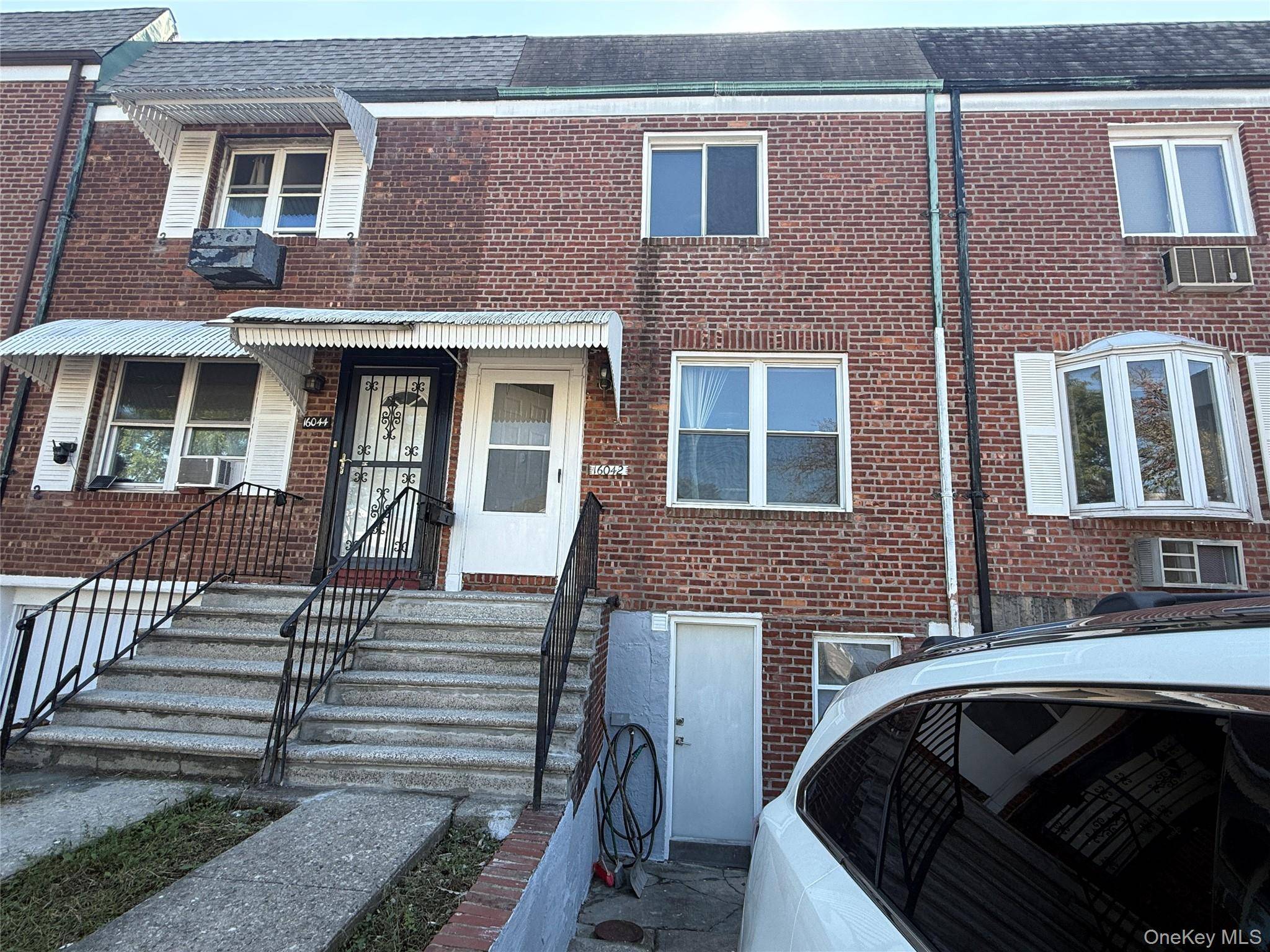 Charming All Brick Attached Townhouse in Prime North Flushing This well maintained tri level 1 family home features a spacious layout with a large living room, an eat in kitchen ...