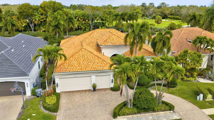 Located in the highly sought after, boutique community of Grande Orchid, this meticulously maintained 3 bedrooms plus Den, 4.
