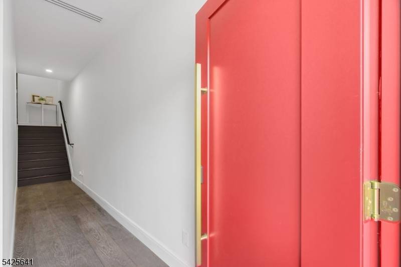Welcome to The Addison at 9 Minerva, a thoughtfully designed, ground up new construction on a private dead end street that sets a new standard for modern living.
