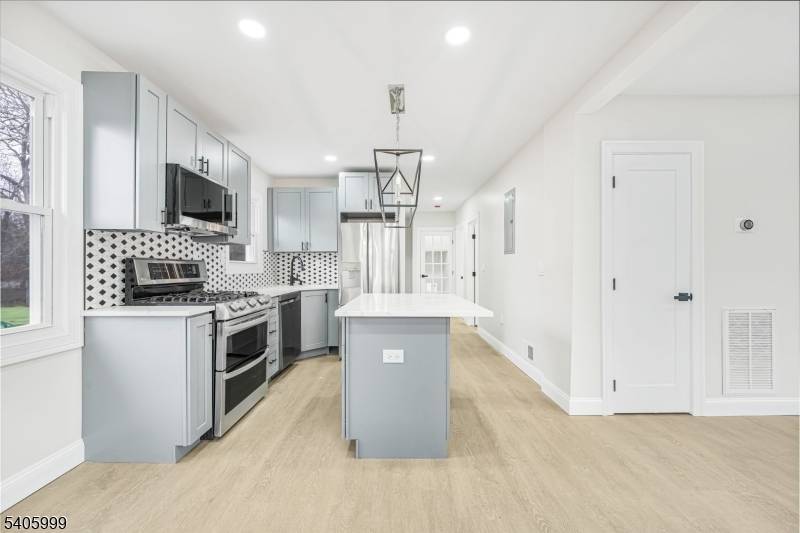 Welcome home to this beautifully renovated 3 bedroom, 1.