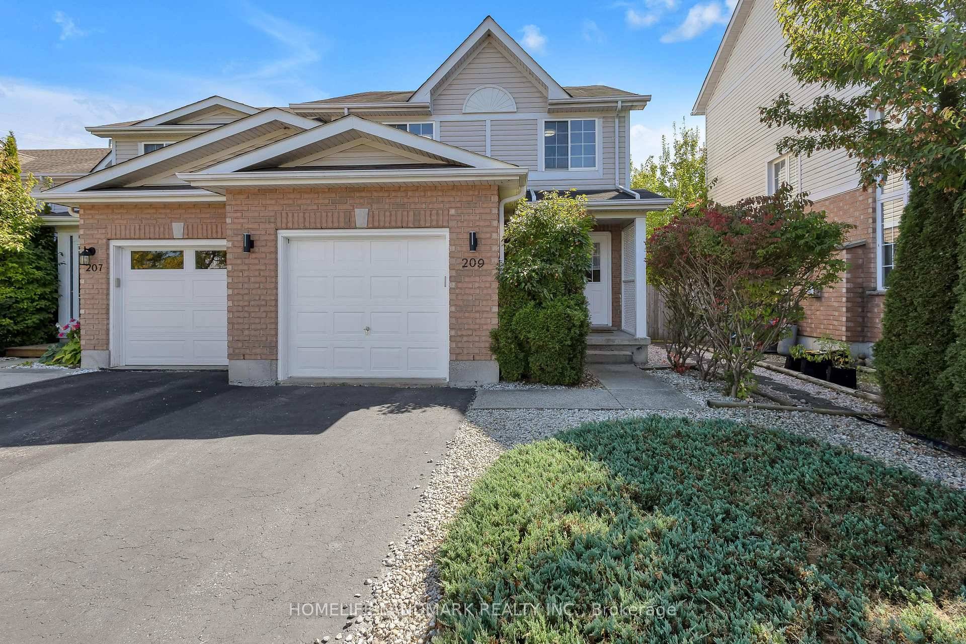 Welcome to 209 Deacon Wood Pl, a meticulously maintained and beautifully upgraded END UNIT freehold townhome in the highly sought after Laurelwood community.