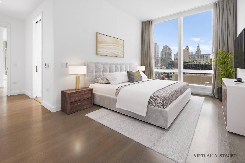 A MUST SEE ! ! ! ! ! ! ! Perched on the 17th floor, this beautiful, sun filled 2 bedroom, 2.