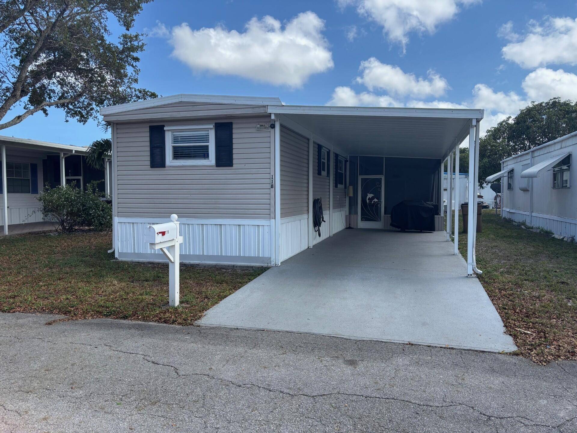 BEAUTIFUL HOME, VERY WELL MAINTANED WITH 2 BEDROOMS, 2 BATH'S AND LARGE ENCLOSED PORCH FOR RELAXING.