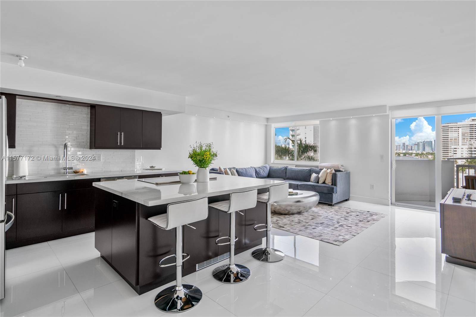 Perfectly located within walking distance of Lincoln Rd, Sunset Harbour and Venetian Isles ; This fully renovated 2BD, 2BA corner unit encompasses the luxury and tranquility of idyllic Miami Beach ...