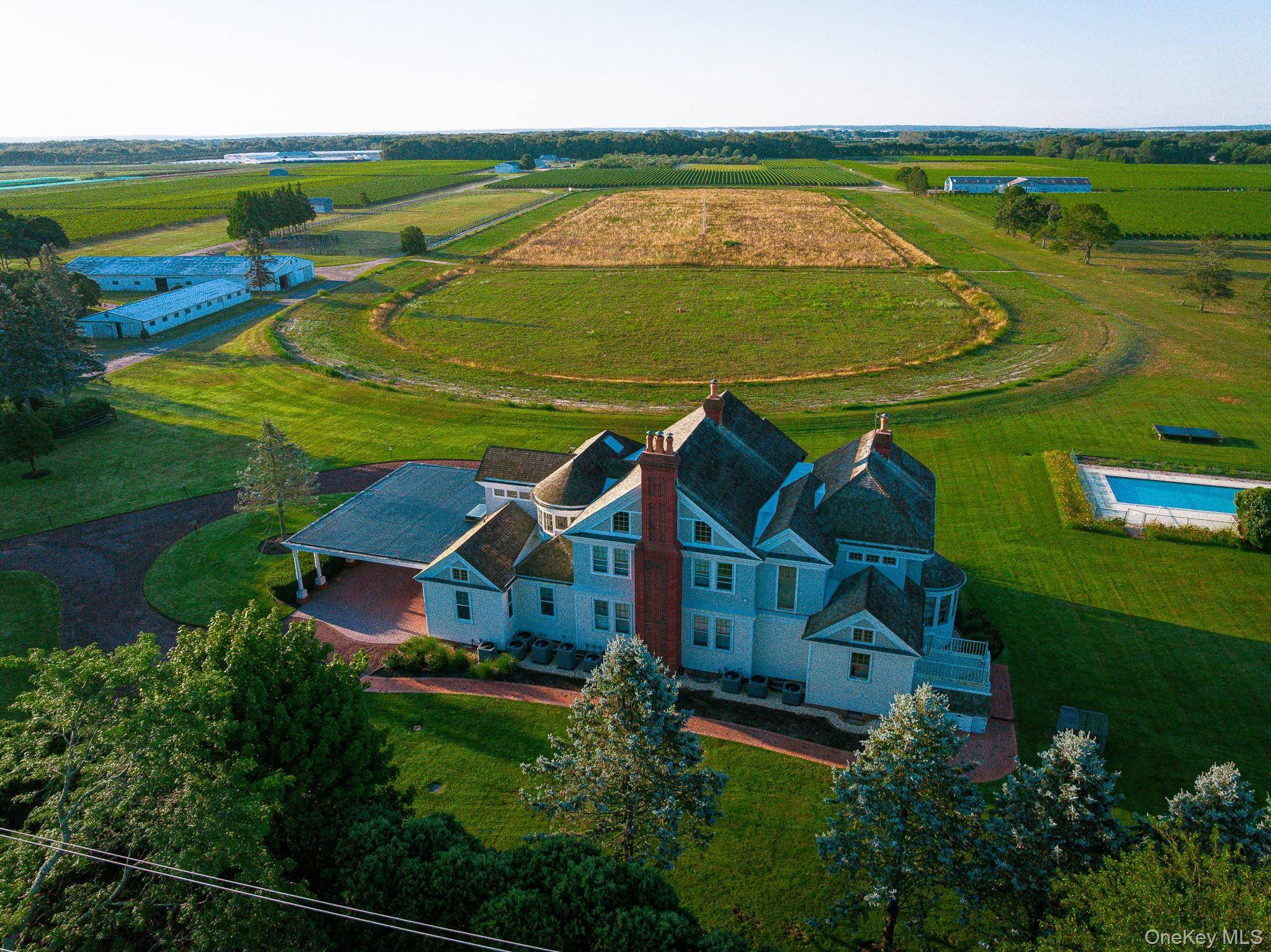 A RARE LEGACY PROPERTY ! Step into the epitome of luxury and charm at Big E farm, a former thoroughbred horse breeding ranch and home to Robert Entenmann.
