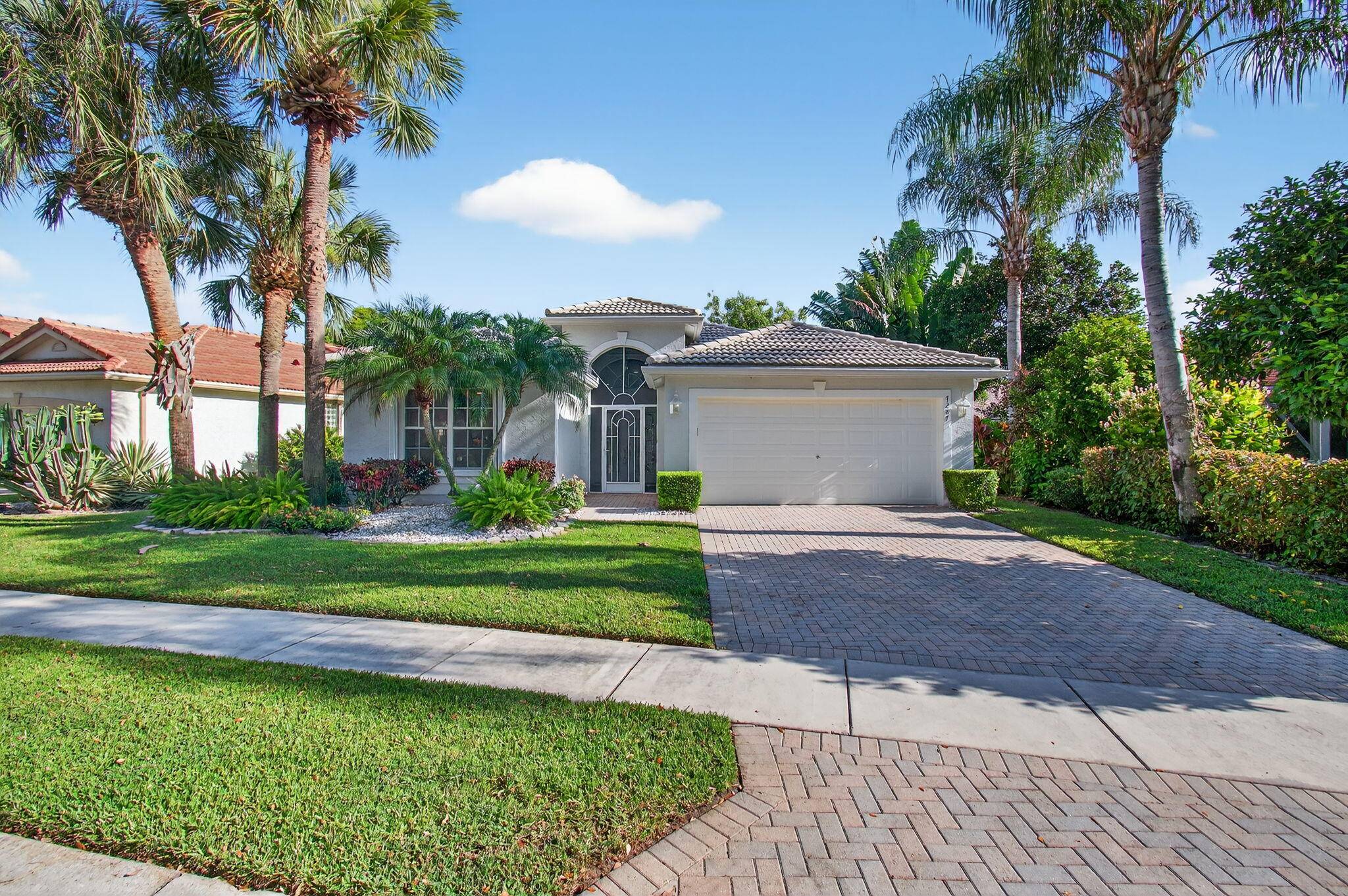 Experience the best of lakefront living in this fully REMODELED 3 bedroom, 2 bath home in the sought after Valencia Isles community.