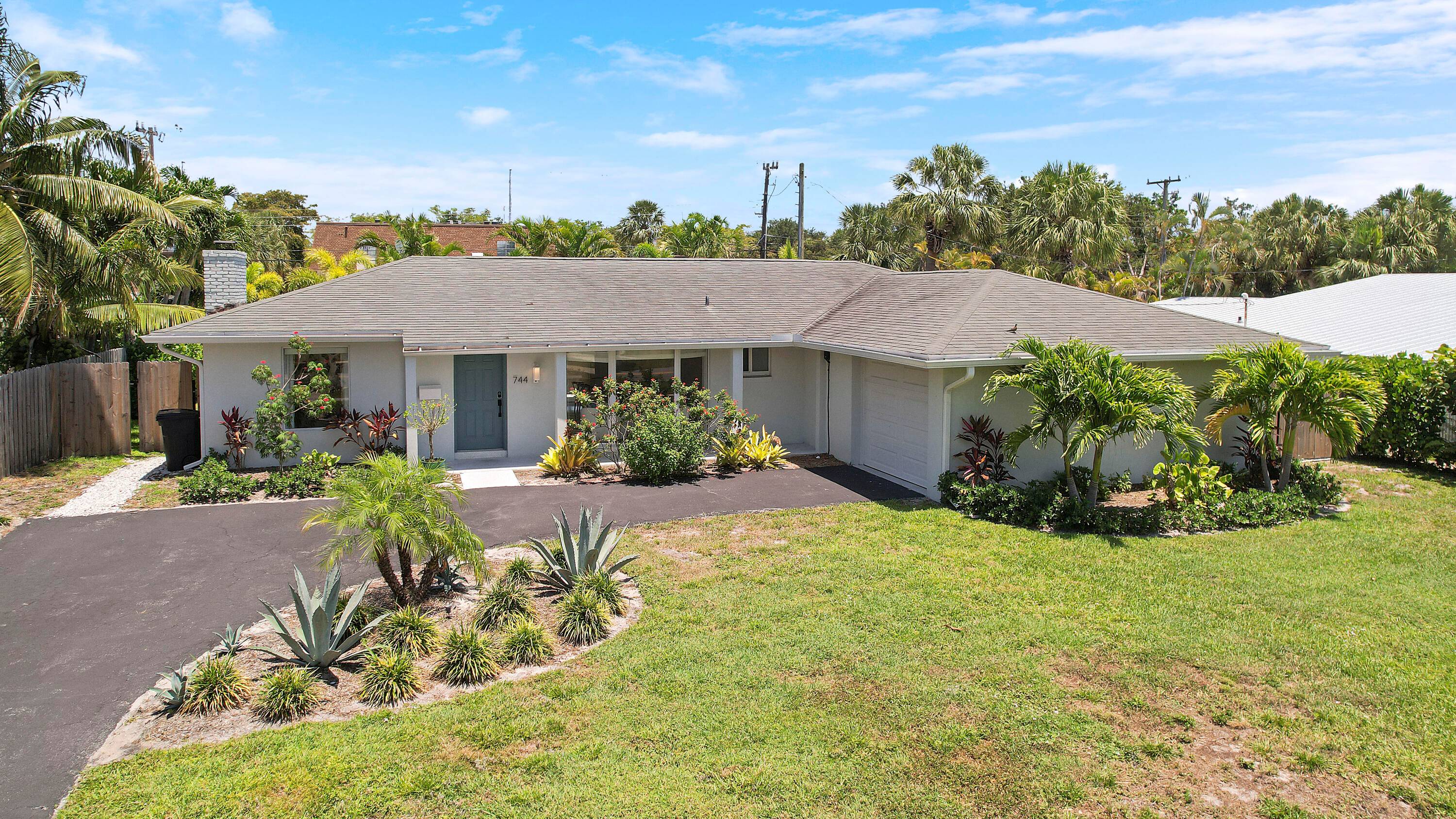 Discover coastal living at its finest in this beautifully renovated and furnished 3 bedroom, 2 bathroom single family home in the desirable Anchorage community of North Palm Beach.