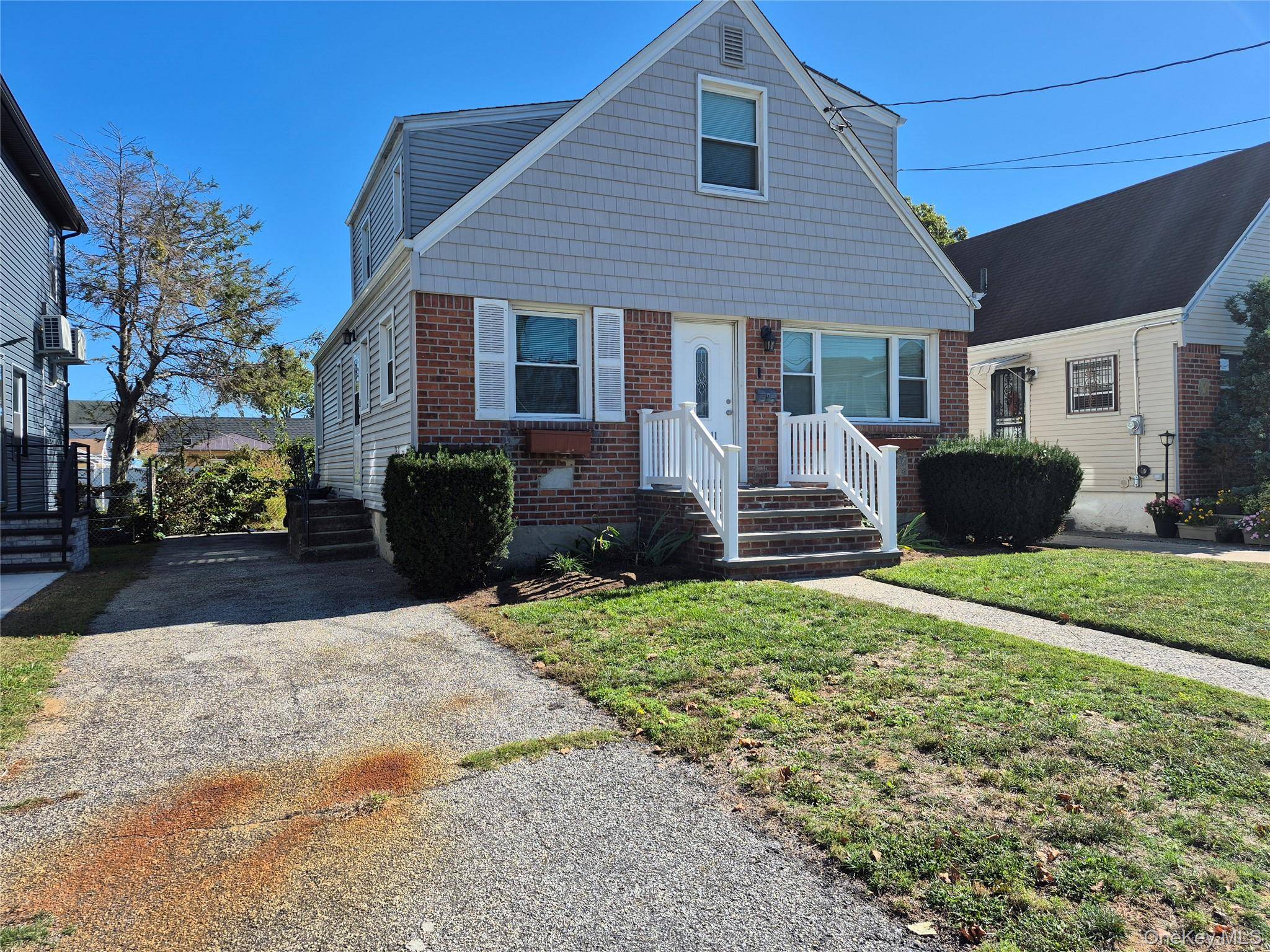 Stunning Mid Block Home Features A Large Sun Filled Living Room With Wall Unit Air Conditioner, Large Eat In Kitchen With Cherry Wood Cabinets, Granite Counter Tops, Stainless Steel Appliances, ...