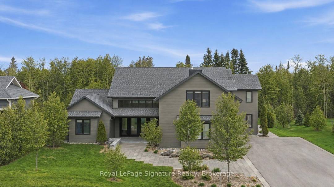 Experience elevated coastal inspired living in this exceptional custom built slab on grade home offering over 4, 200 sq.