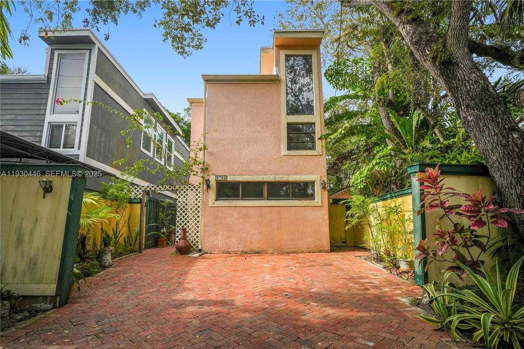 Located in prime North Coconut Grove setting, this 3 bed 3 bath residence offers a flexible floor plan and abundant natural light, providing the ideal canvas for a custom renovation.