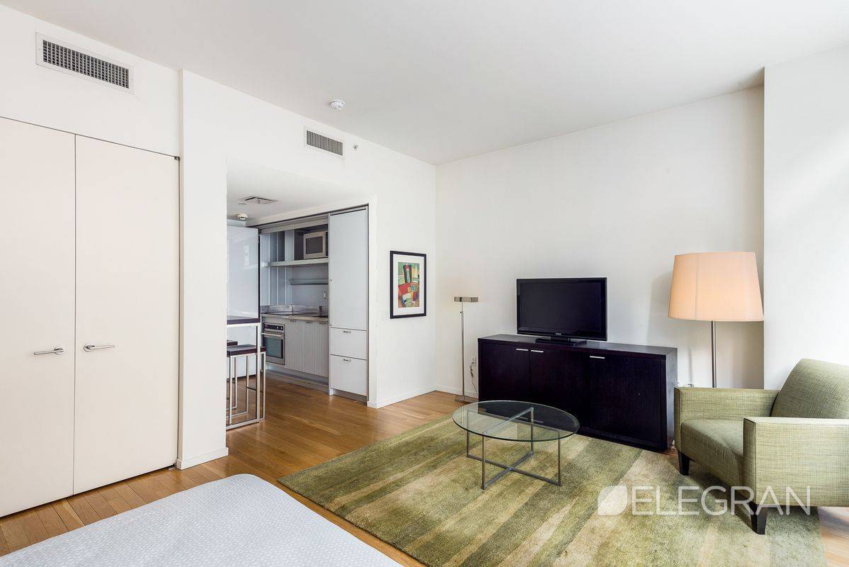 Spacious fully furnished corner big studio apartment available in a full service luxury building.