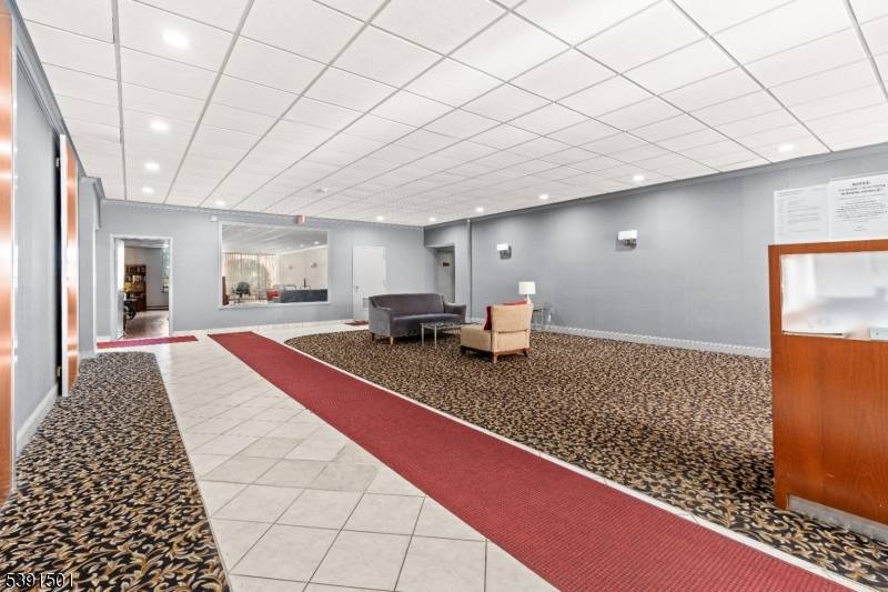 This spacious and sun filled 2 bedroom, 2 bathroom condominium with one en suite bathroom is now for sale in the prestigious Presidential Tower Building in Passaic Park.