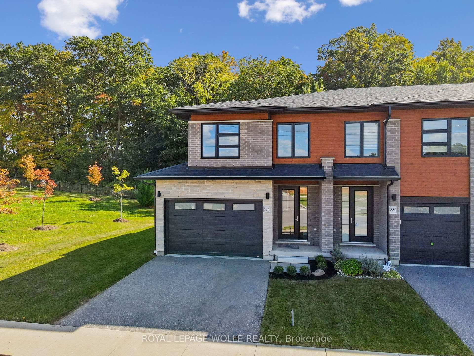 THIS IS THE ONE ! Freehold END UNIT Townhome in highly desirable Doon, minutes to the 401, with RARE 1.