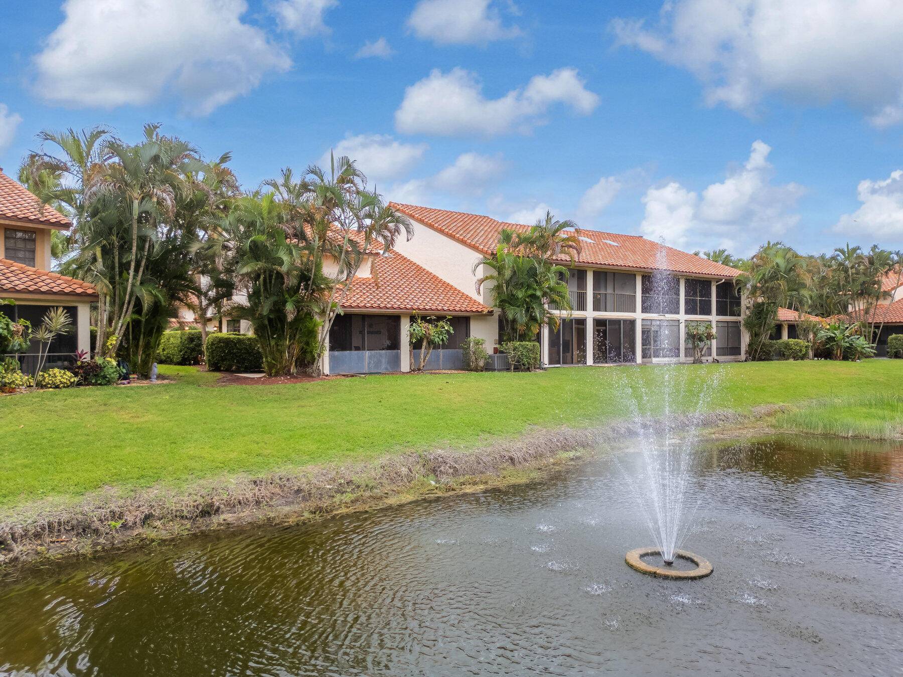 Beautiful waterfront, corner unit condo in La Mirada at Boca Pointe.