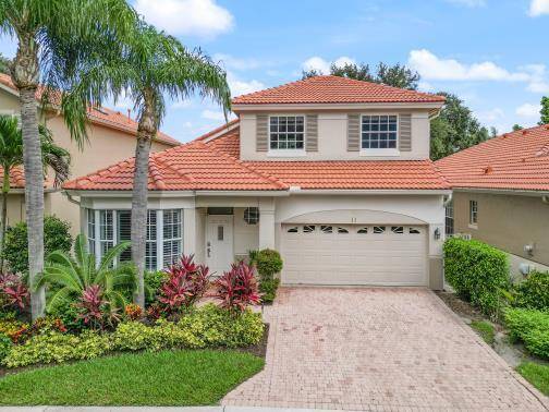 Welcome to this stunning, newly updated residence in the highly sought after Monterey Pointe subdivision of PGA National.