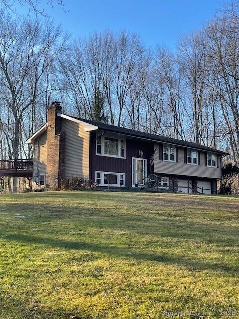 Raised ranch with new kitchen, new Anderson windows, newer roof, tile and hardwood floors throughout main level and riverstone fireplace located on very quiet street.