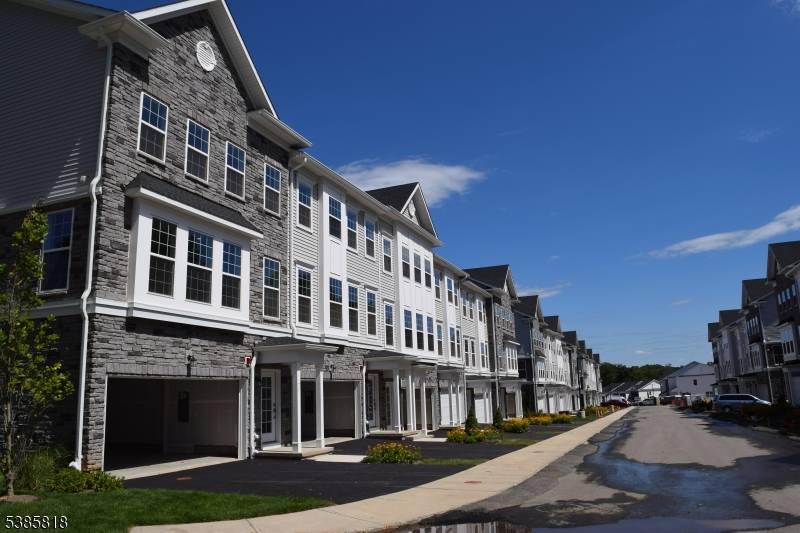 Be the first to live in this BRAND NEW townhome Beautiful 3 level Pershing model.