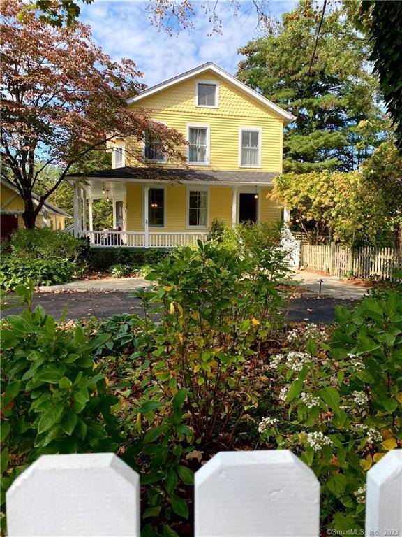 Beyond a white picket fence, sits this pretty colonial farmhouse close to Fairfield Center w AMAZING property !