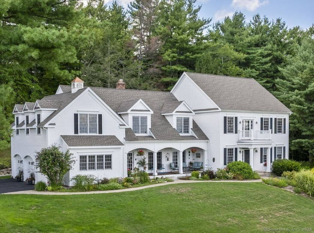 One of just eight custom homes in a 64 acre enclave inspired by the iconic white houses of Newfane, Vermont.