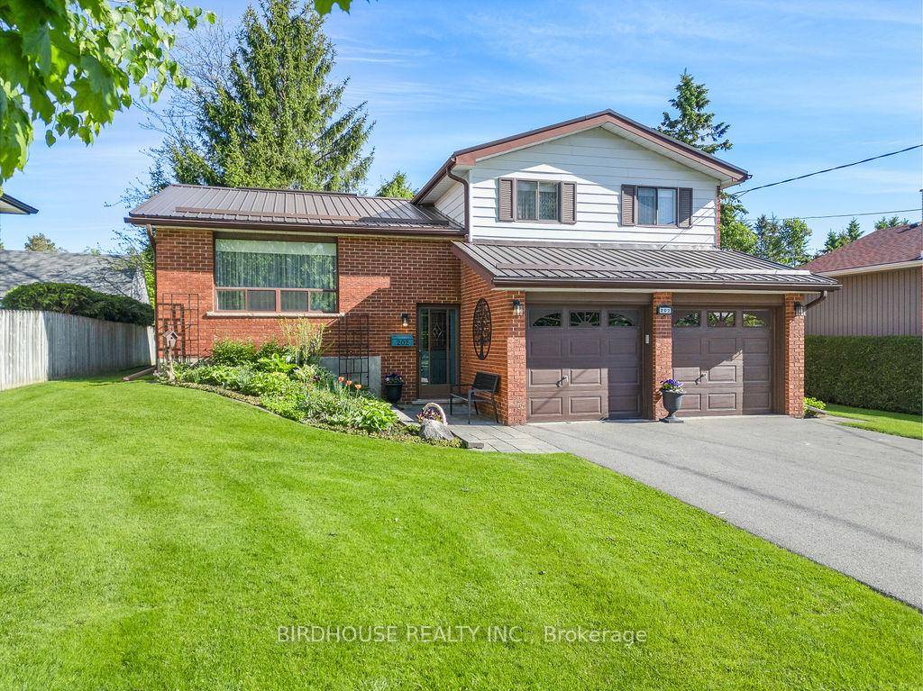 OVERSIZED LOT This spacious sidesplit sits on an oversized lot of over half an acre in town !