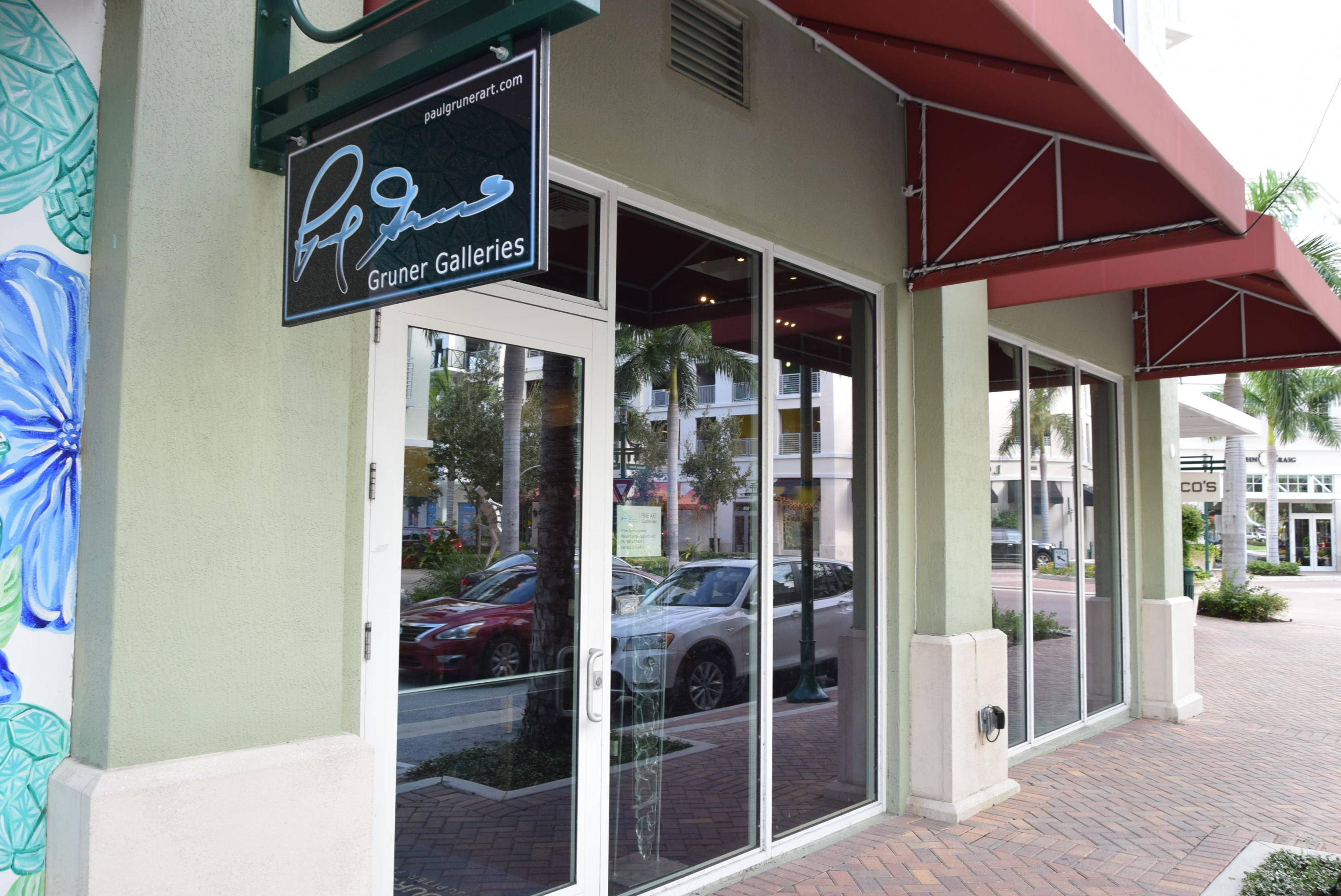 738 SF retail office space with check out counter and bathroom.