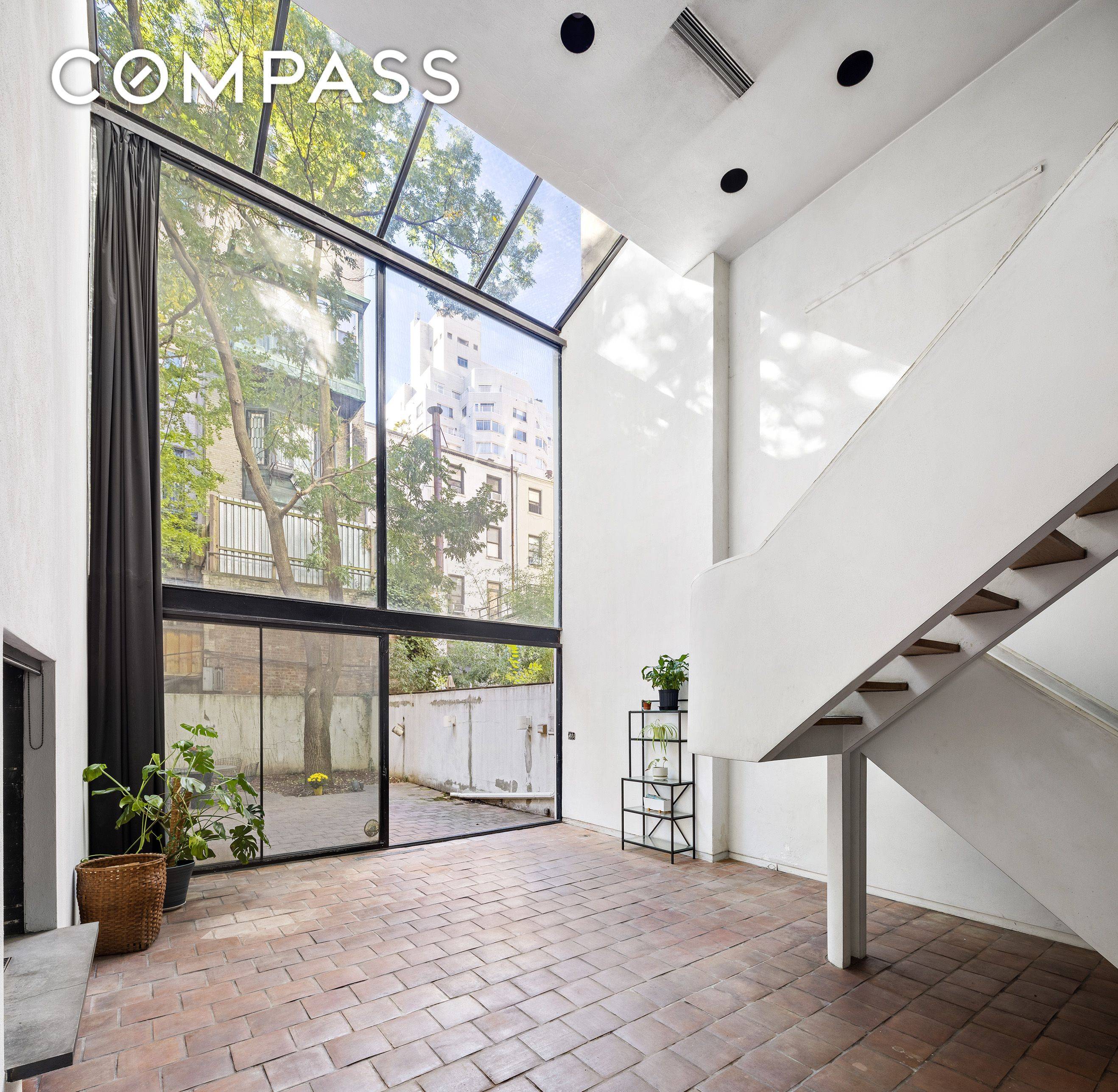 20' Wide Brownstone W Private Garage One of only 6 private garages in the East 60's west of Park Avenue, this 20' wide 5 story brownstone with sensational scale is ...