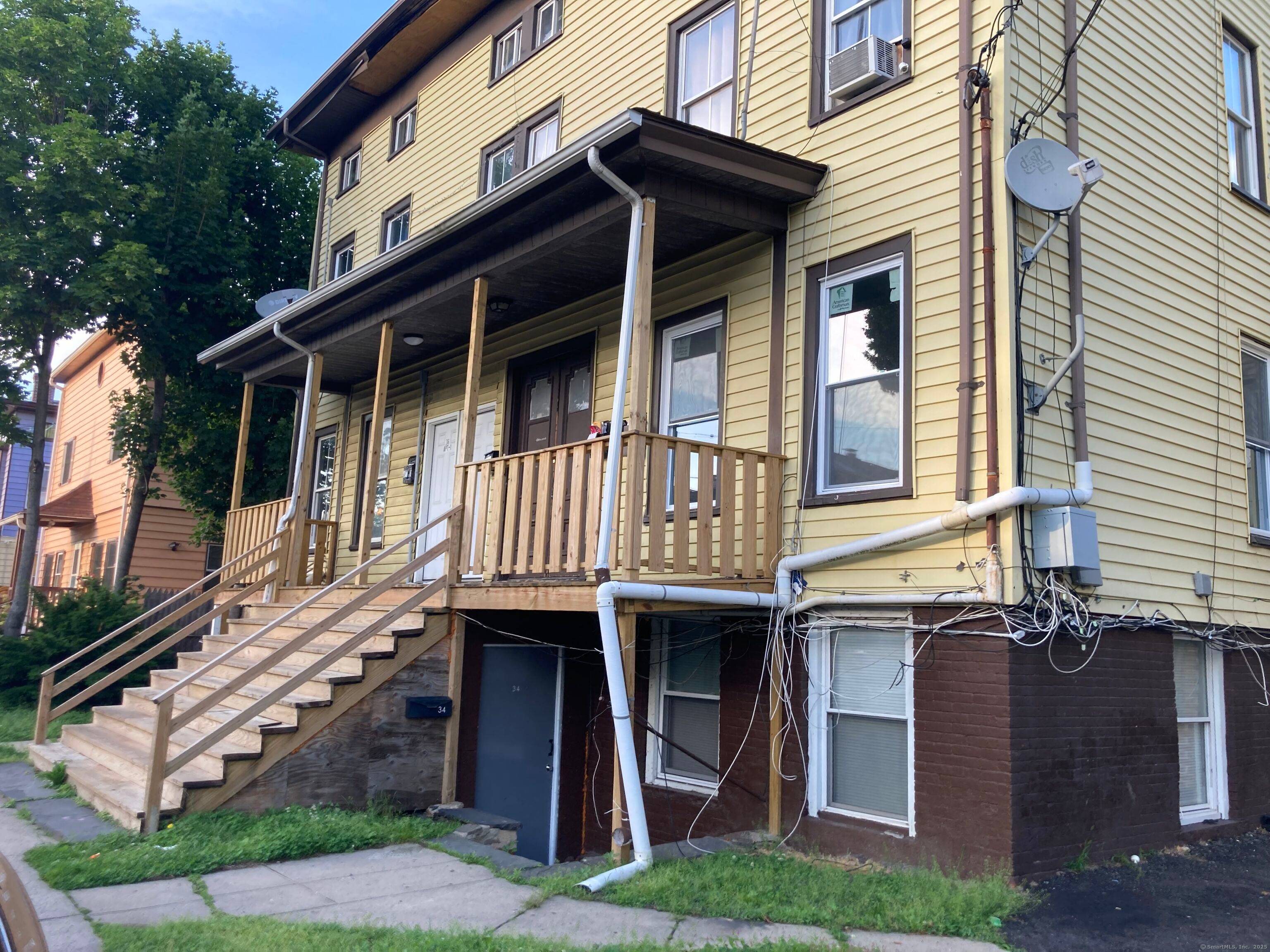 10 CAP at ENTRY ! ! ! Just off Barnum Avenue and less than one block away from Washington Park in the middle of Bridgeport's East Side neighborhood.