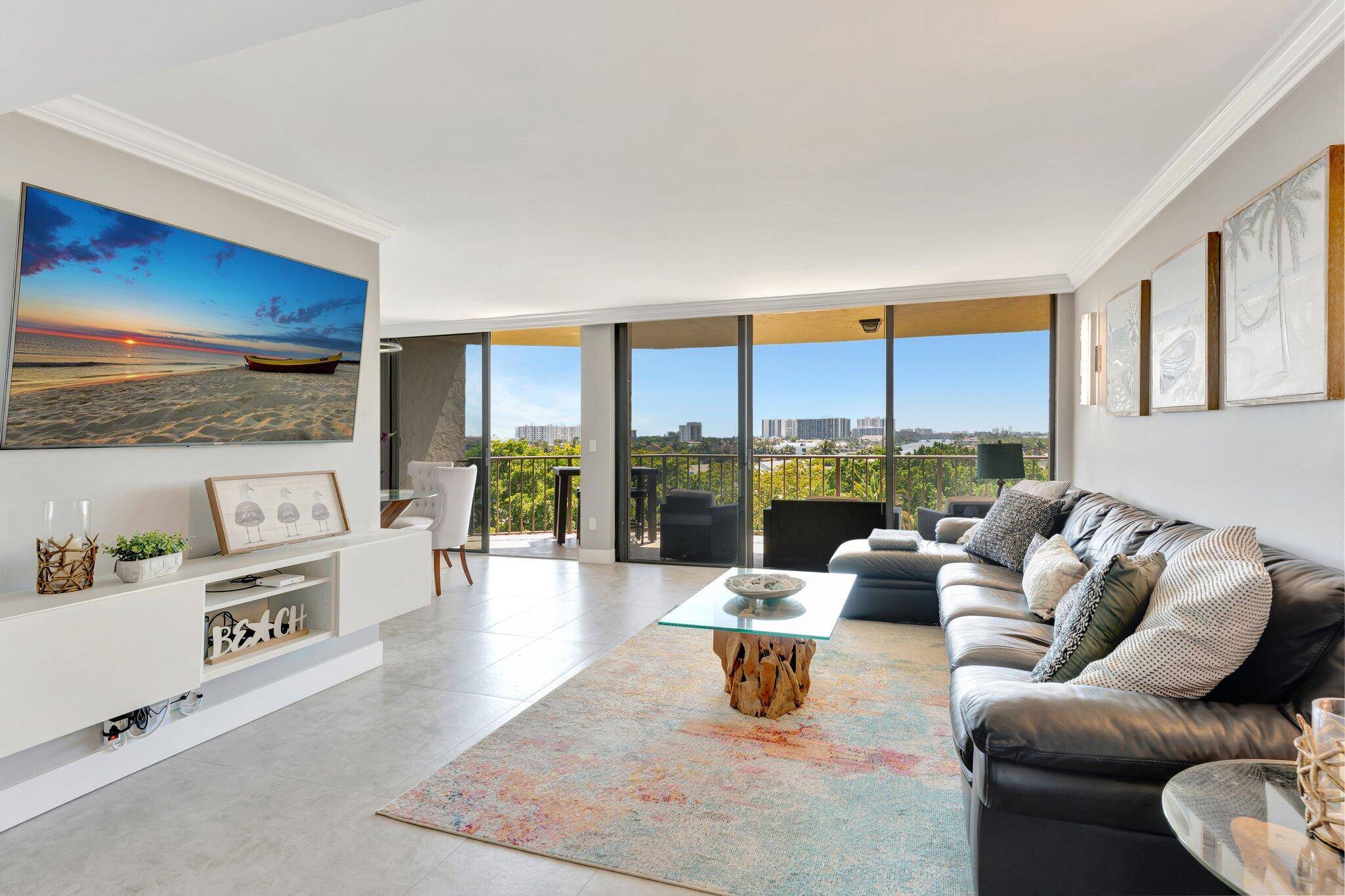 Welcome to this beautifully renovated two bedroom condo, where modern elegance meets coastal charm.