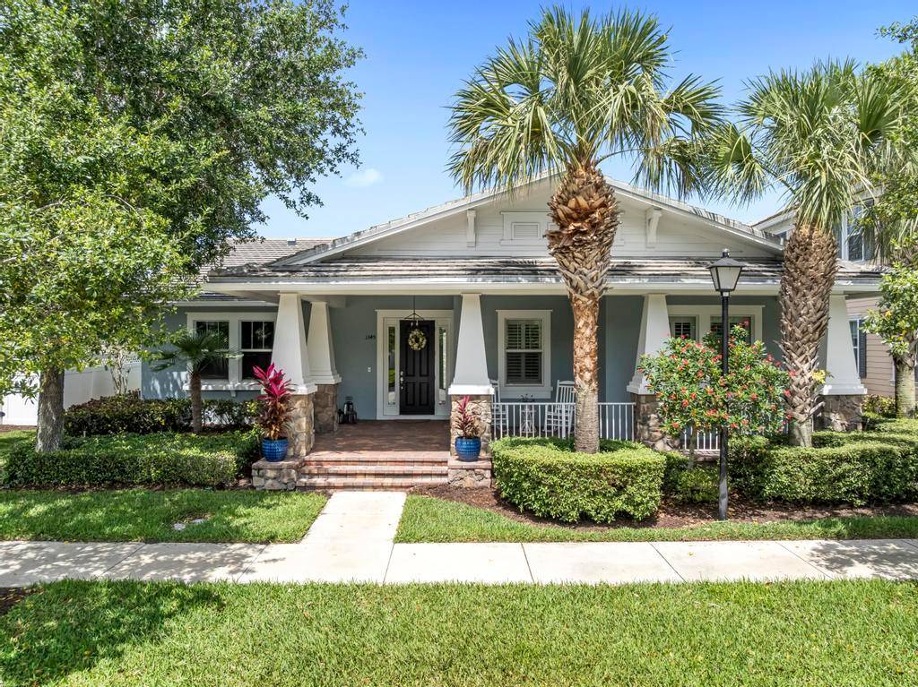 Immaculate single story home located in Windsor Park at Abacoa, situated on a quiet street with a large fenced yard.